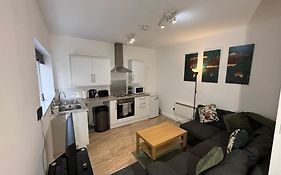 Enjoy A Spacious Lounge With A Cozy Sofa Bed And A Private Ensuite Bedroom